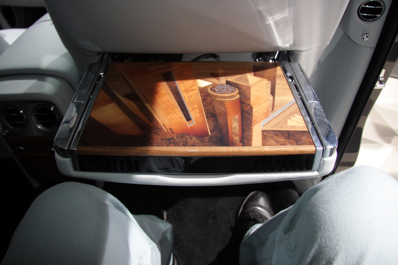Illustration for article titled This $600K Rolls-Royce Has A City Carved Into Its Interior